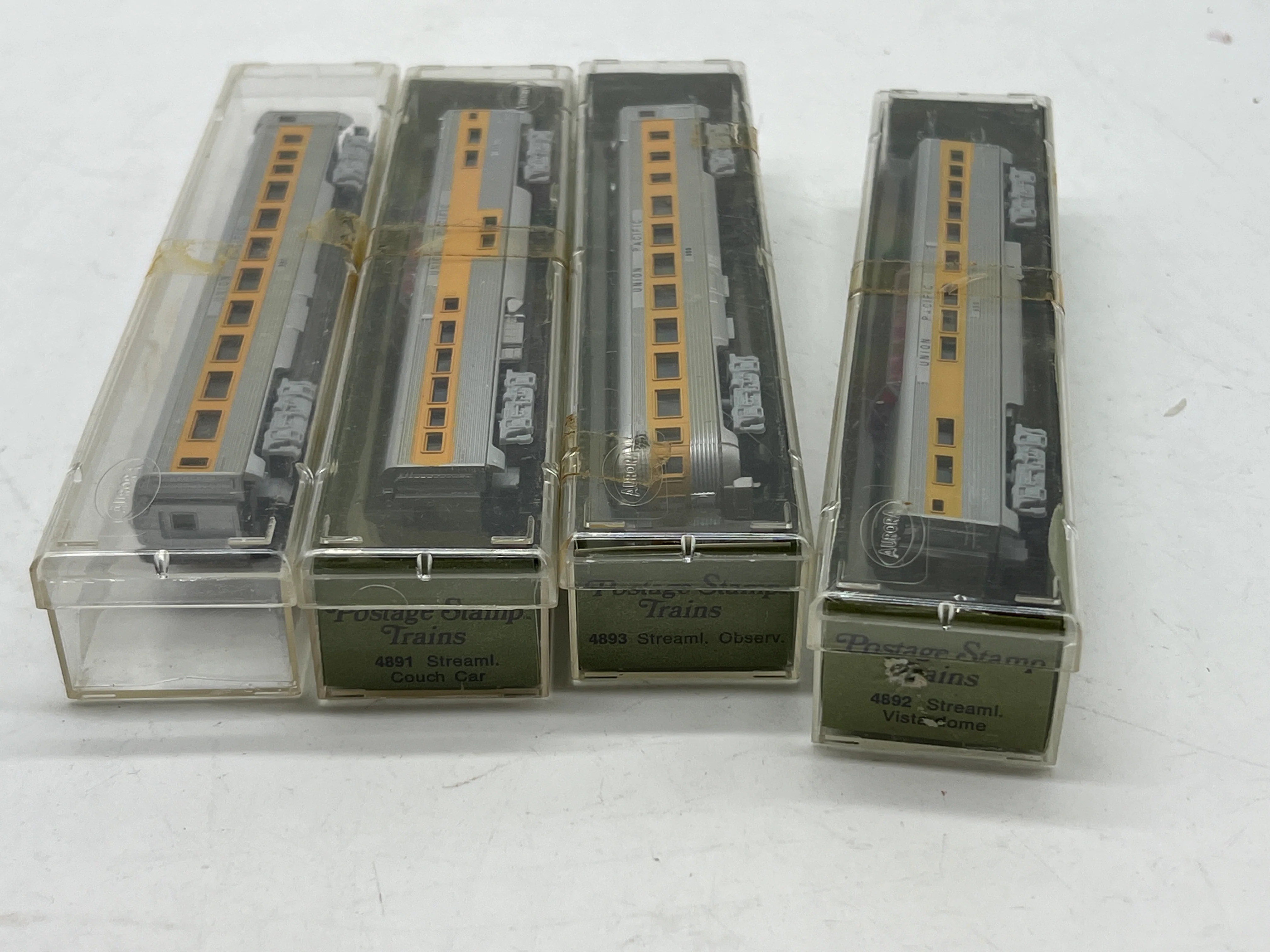 Aurora postage stamp trains set of 4 Union pacific UP Passenger cars yellow/silver N SCALE NEW