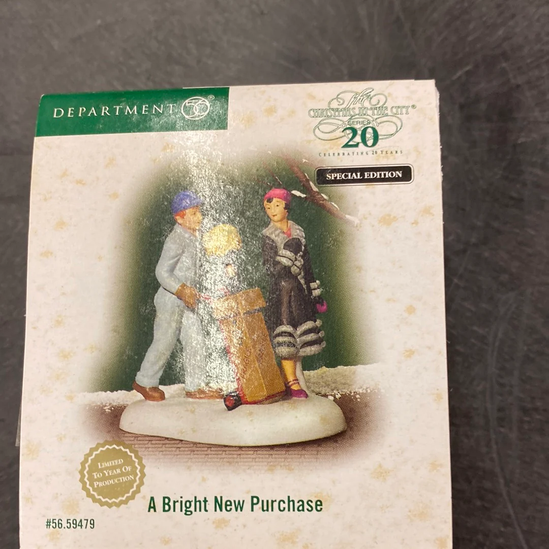 Department 56 Christmas in the City 56.59479 A Bright new purchase figures