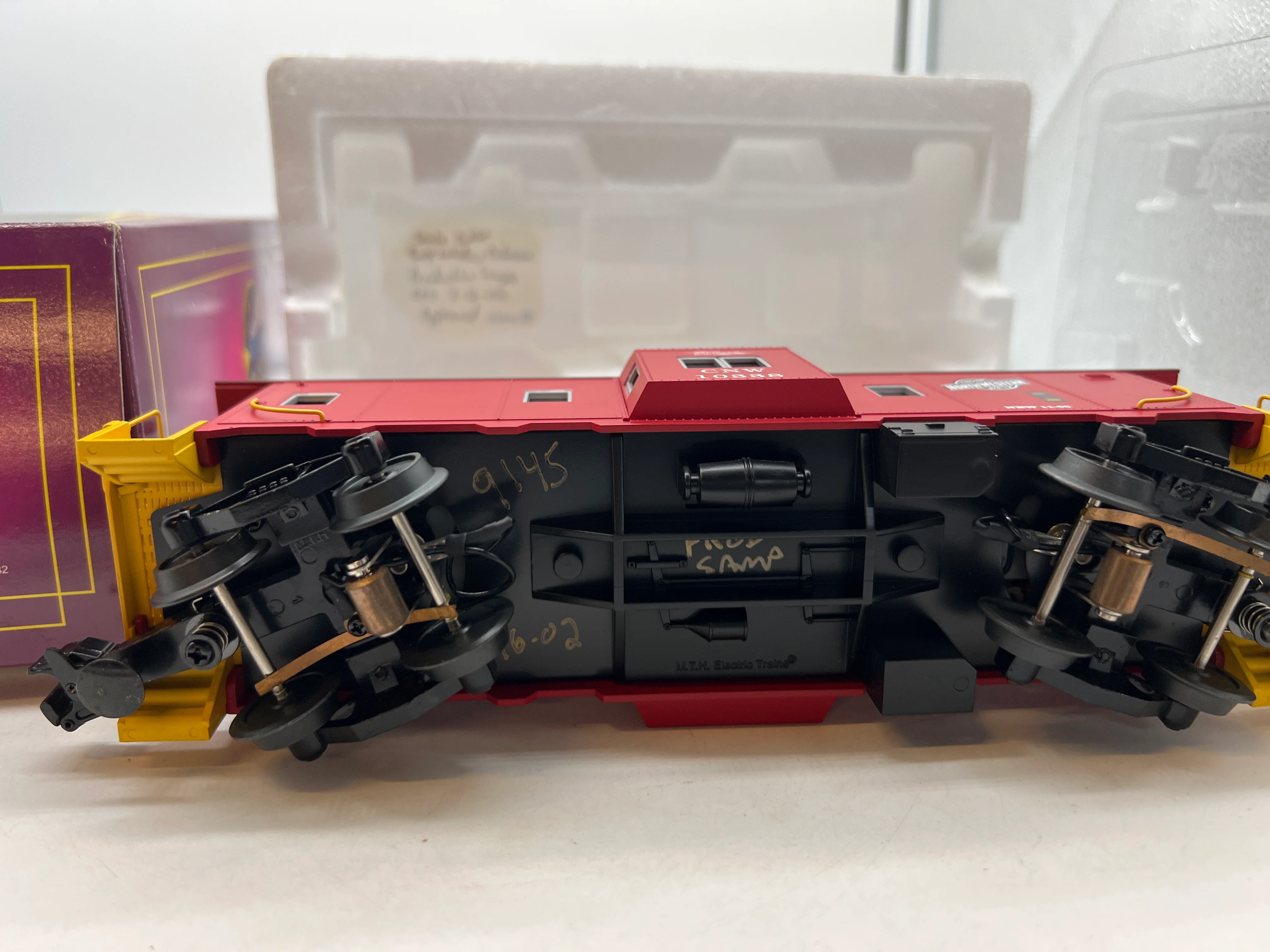 MTH Premier 20-91094 Chicago & North Western Bay Window Caboose production sample O Scale NEW - Image 3